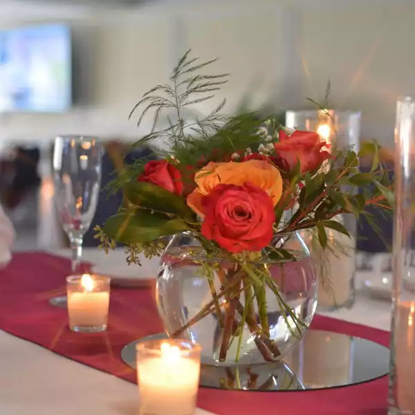 flower vase on red tablecloth