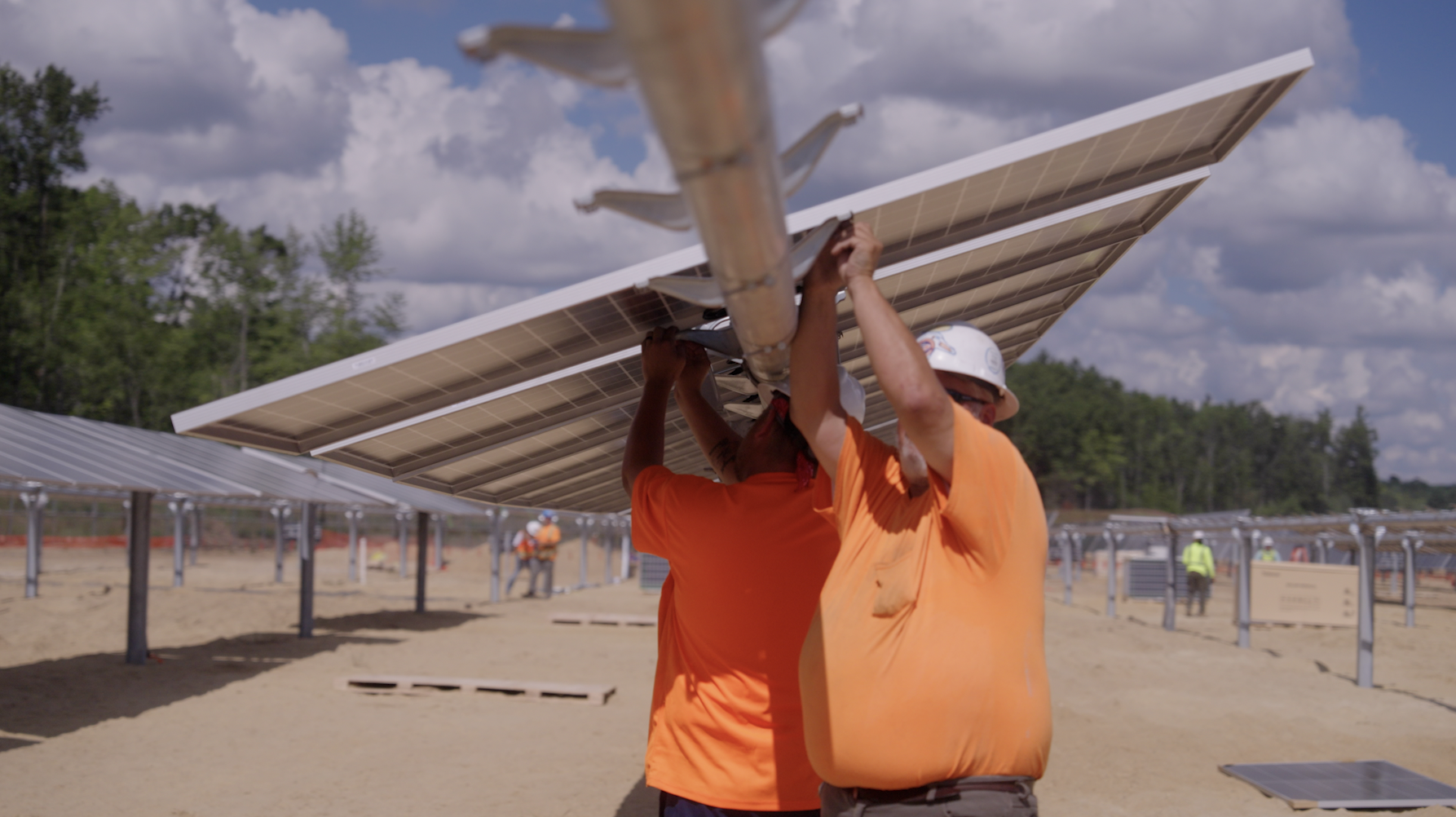 Image of workers installing Solar Panels