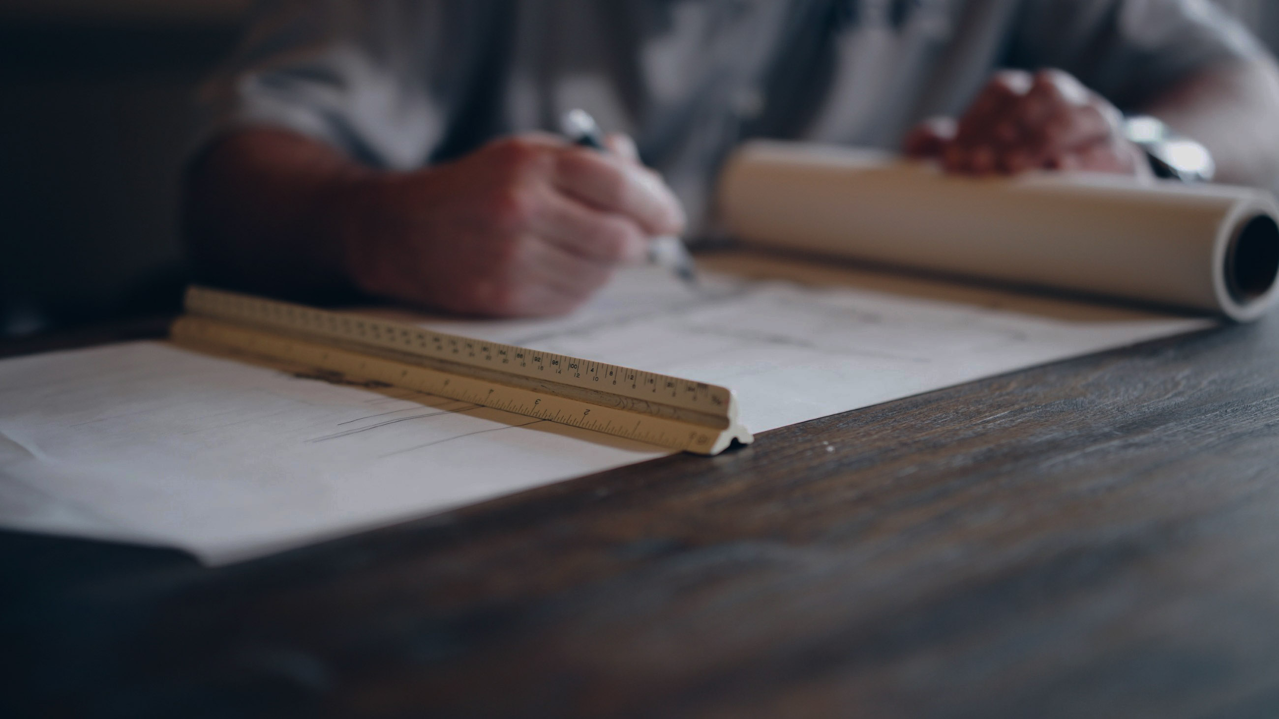 Architect working on building plans