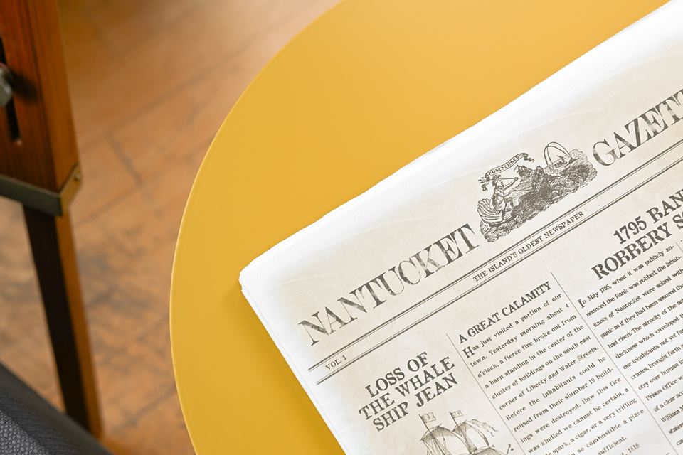 Lighthouse on the beach next to the ocean