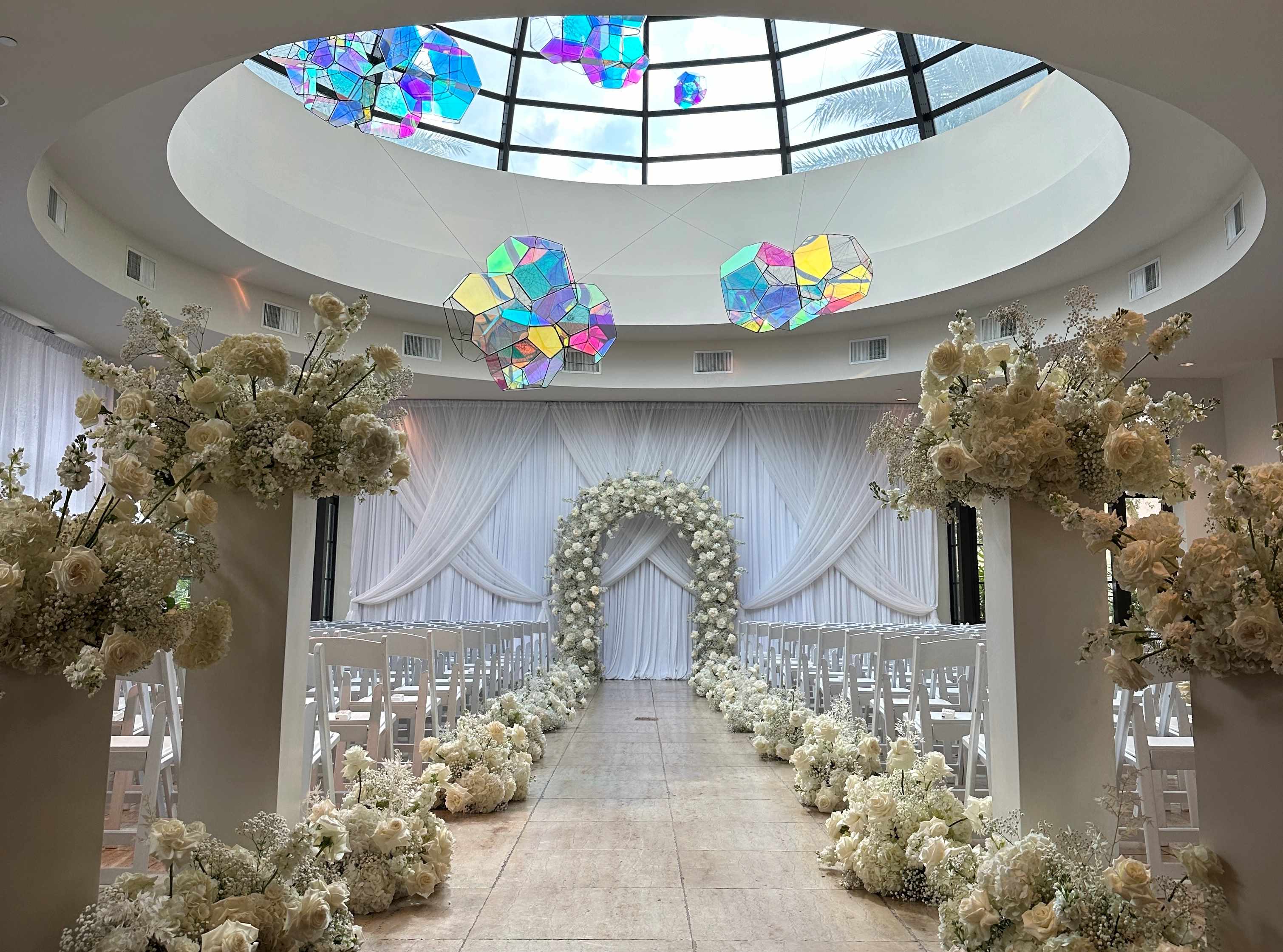 Indoor ceremony set in The Alfond Inn's Conservatory space