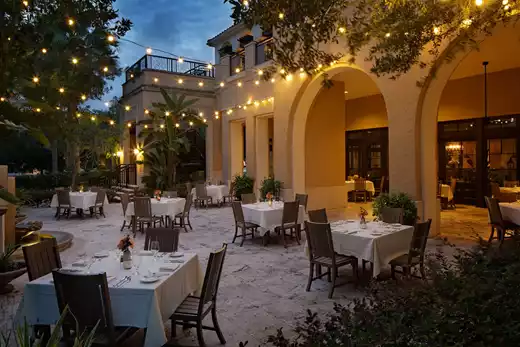 Outdoor dining patio with hanging string lights