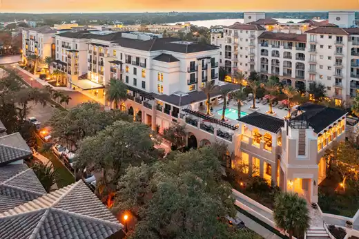 Exterior view of The Alfond Inn and the outdoor pool from the street