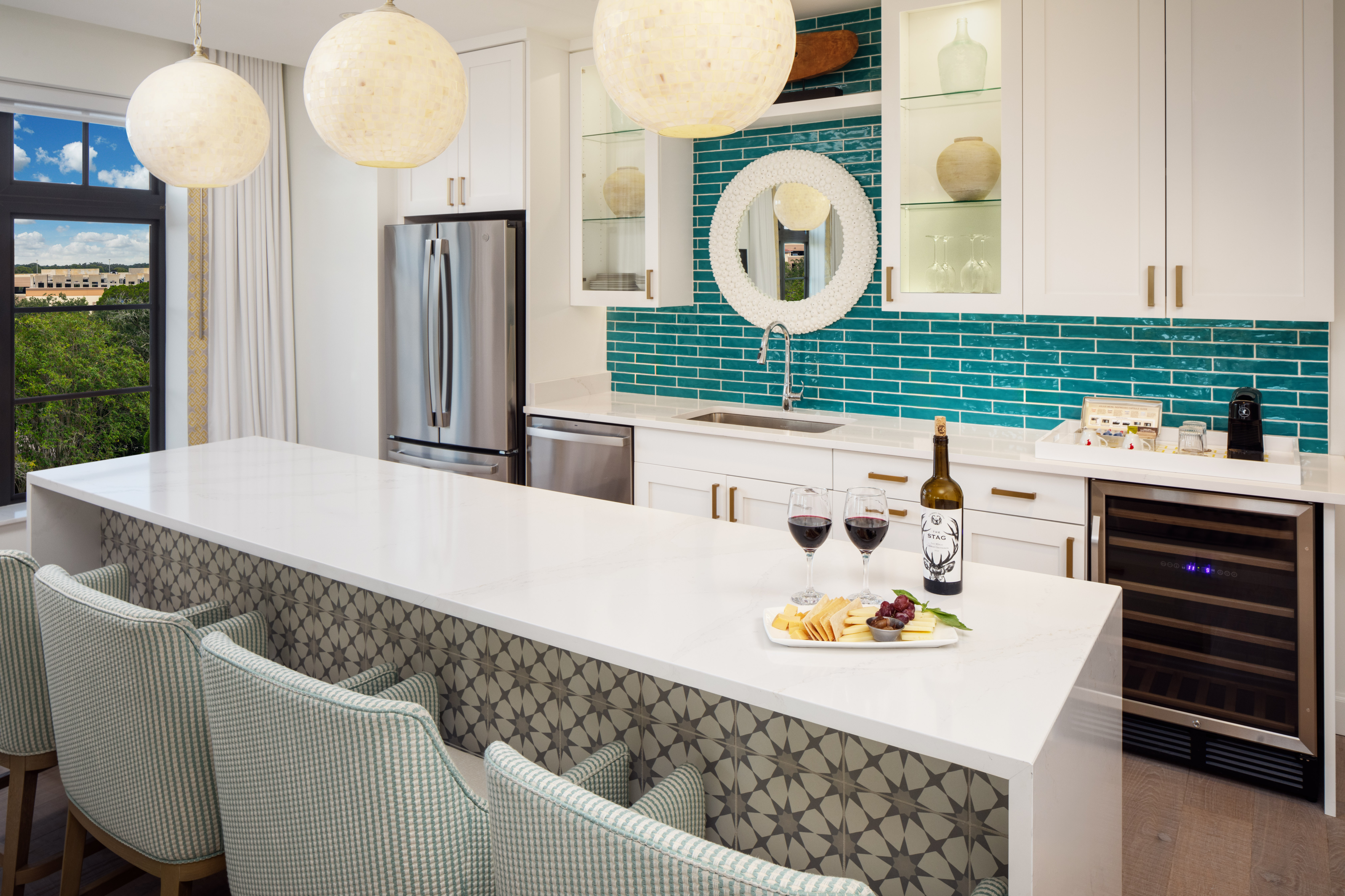 Wine and treats in a Grand Suite at The Alfond Inn