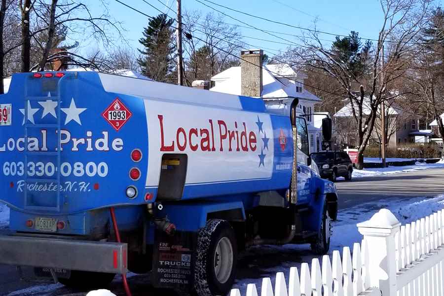 Local Pride Heating Oil Truck Making a Delivery
